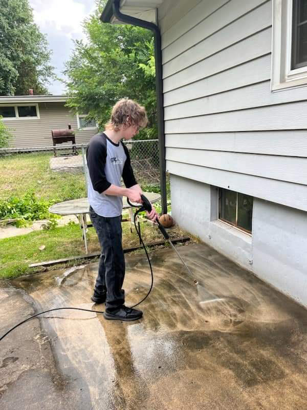 shephard center kck volunteer powerwashing home patio