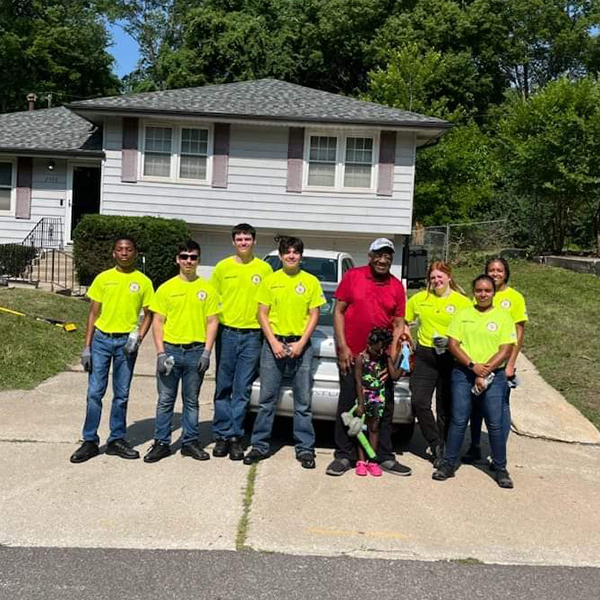 shepherd's center kck volunteers in front of home