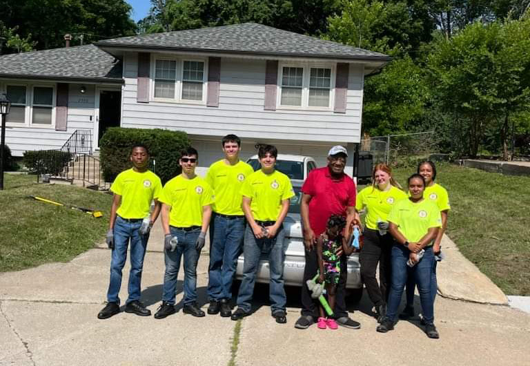 shepherd's center kck volunteers in front of home